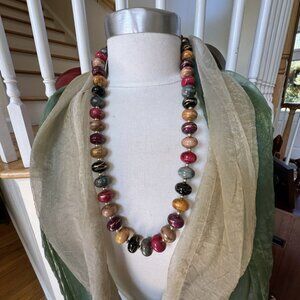 Multicolored beaded necklace with small gold bead interface and hook clasp.!